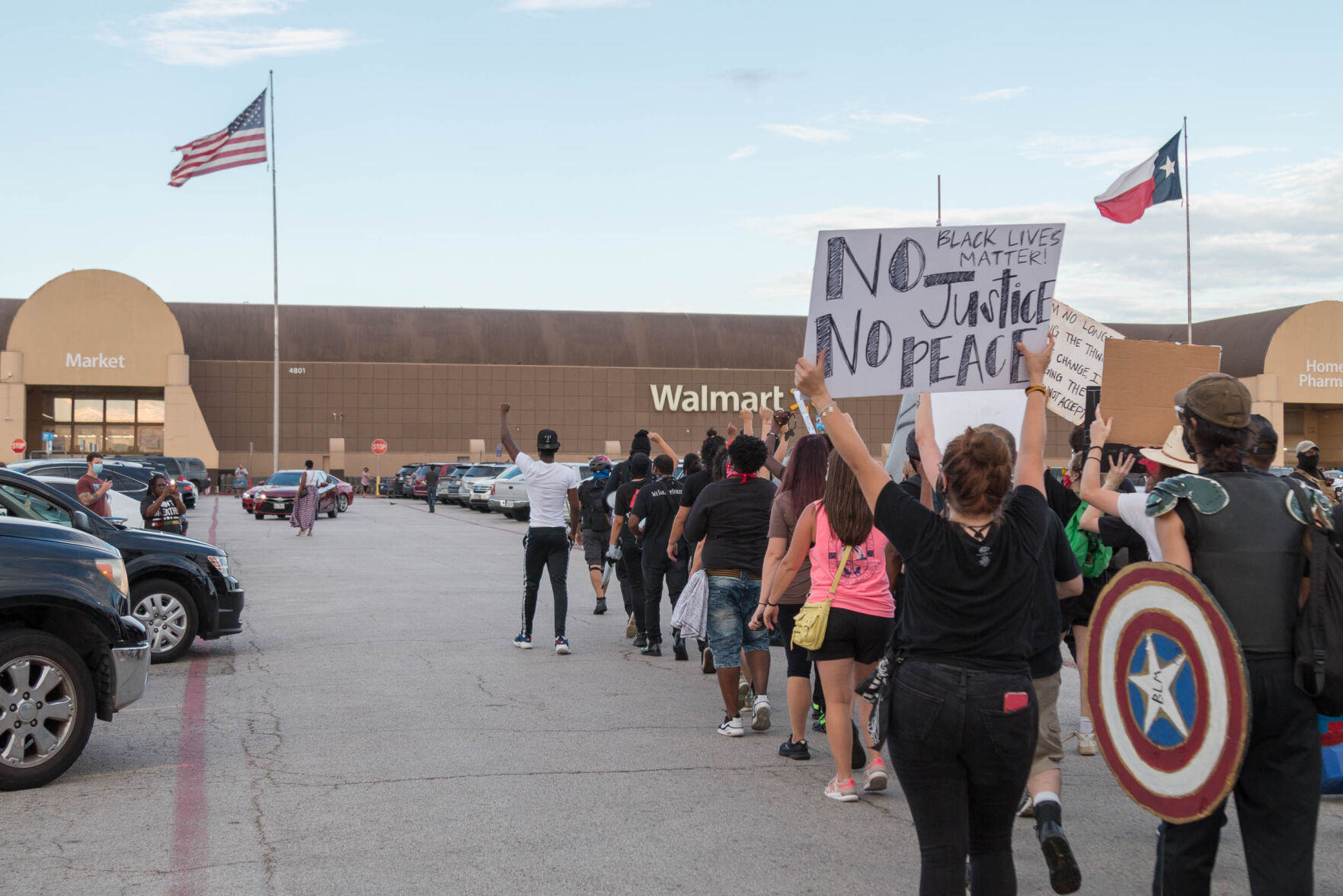 Photos: Activist group We Take The Streets holds march through Arlington in third month of protests